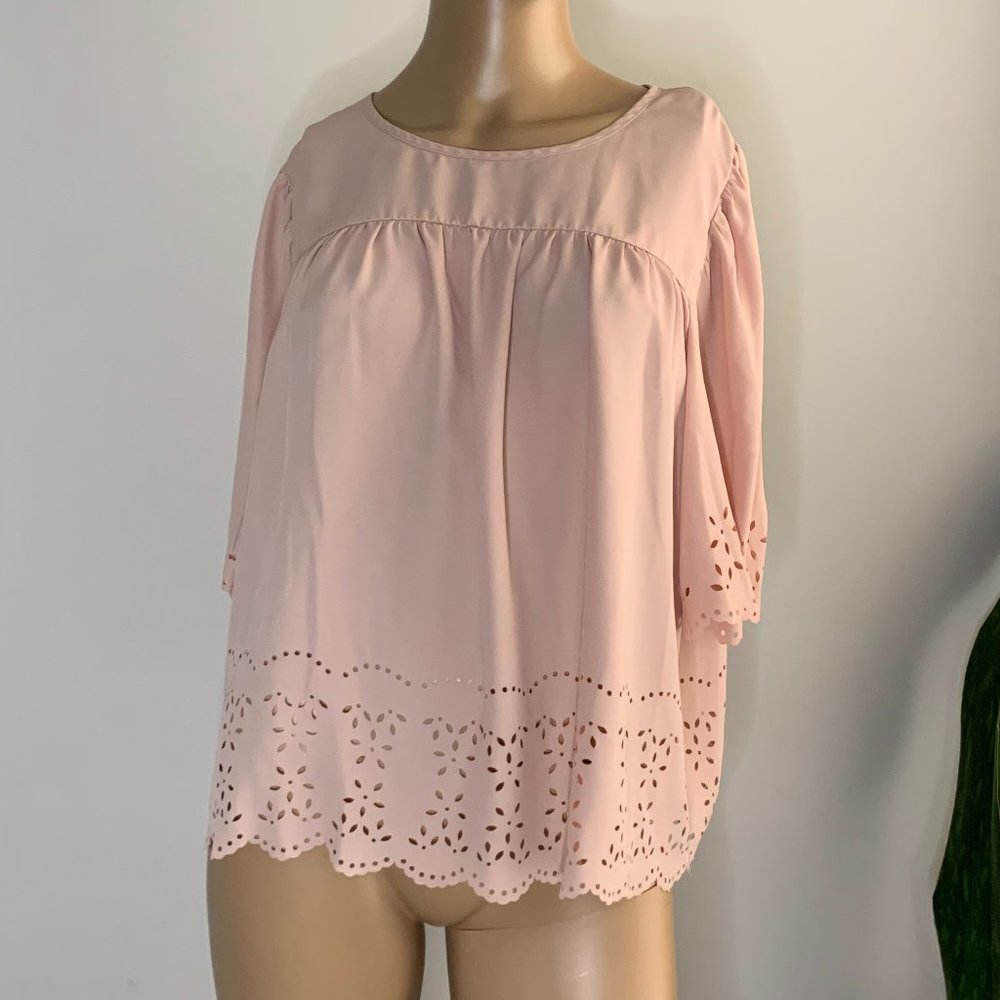 Kaari Blue peachy colored flowy top